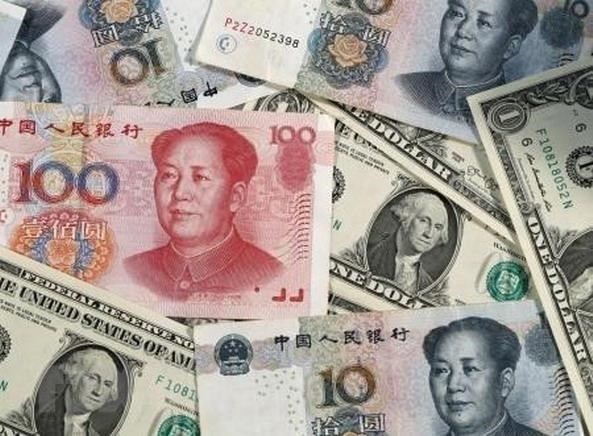 China, US reach consensus on exchange rate - ảnh 1