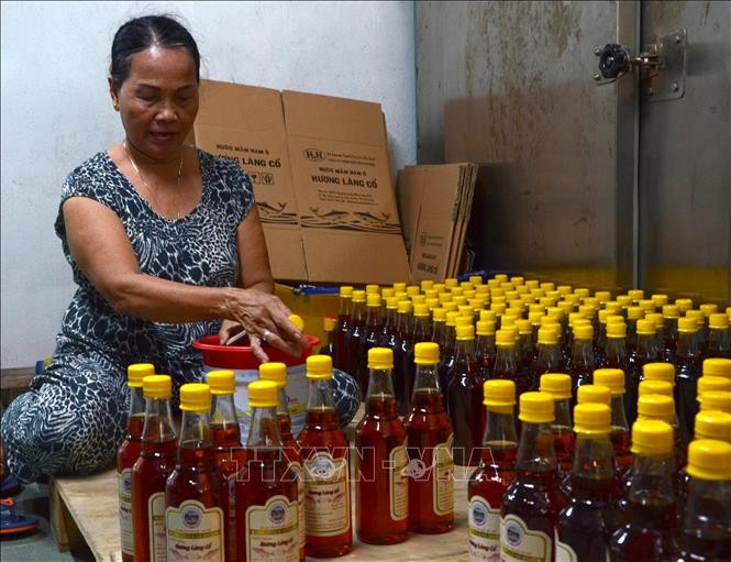 Nam O fish sauce making craft recognized as national intangible cultural heritage - ảnh 1