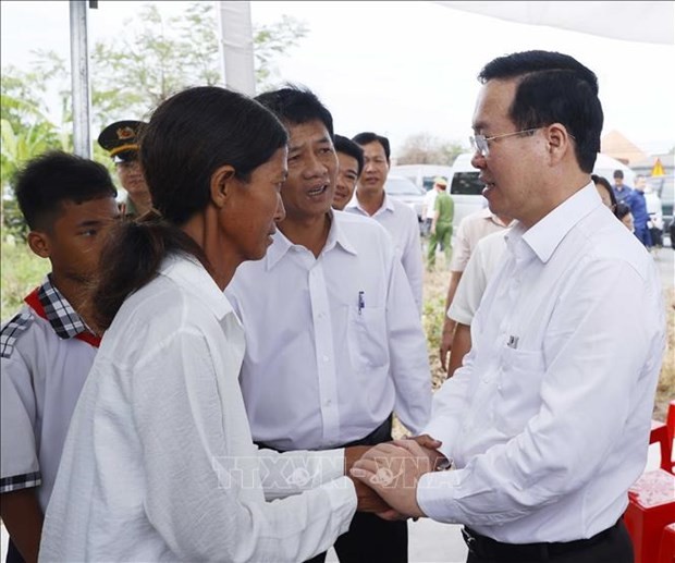 President attends event to sum up construction of houses for the poor in Soc Trang - ảnh 1