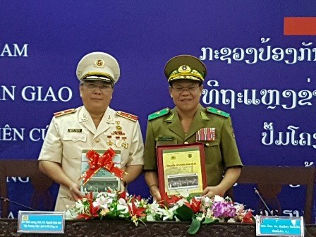 Tăng cường hợp tác khoa học lịch sử giữa hai Bộ Công an Việt Nam và Lào  - ảnh 1