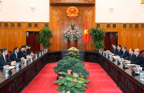 Thủ tướng Nguyễn Xuân Phúc tiếp Bộ trưởng Kế hoạch và Đầu tư Lào - ảnh 1