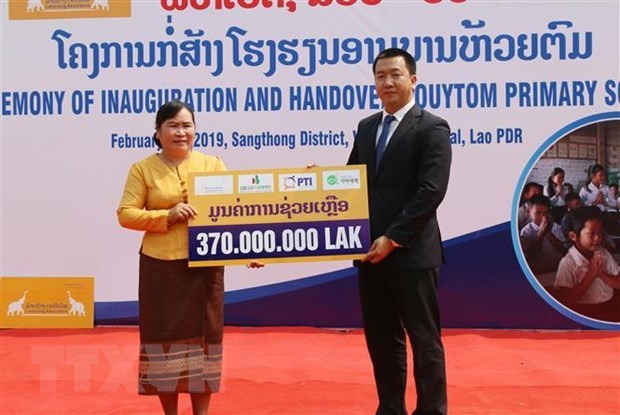 Doanh nghiệp Việt Nam đầu tư tại Lào tích cực thực hiện trách nhiệm xã hội  - ảnh 1