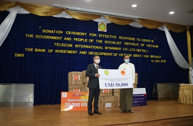 Lễ trao quà ủng hộ của Chính phủ Việt Nam cho Myanmar trong công tác phòng chống đại dịch Covid-19 - ảnh 1