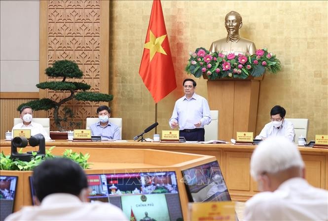 Thủ tướng Phạm Minh Chính: Chính phủ tiếp tục tạo điều kiện tối đa để Thành phố Hồ Chí Minh và các tỉnh sớm đầy lùi dịch - ảnh 1