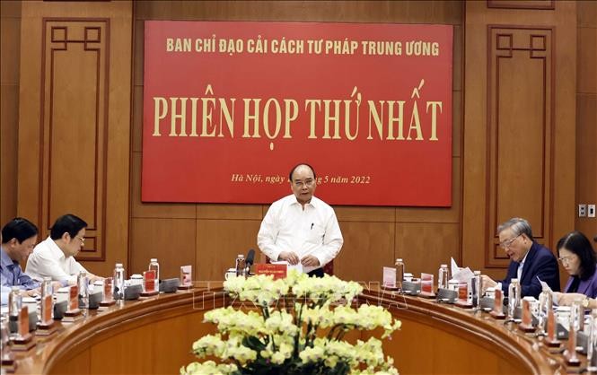 Chủ tịch nước Nguyễn Xuân Phúc chủ trì phiên họp thứ nhất năm 2022 Ban Chỉ đạo Cải cách Tư pháp Trung ương - ảnh 1