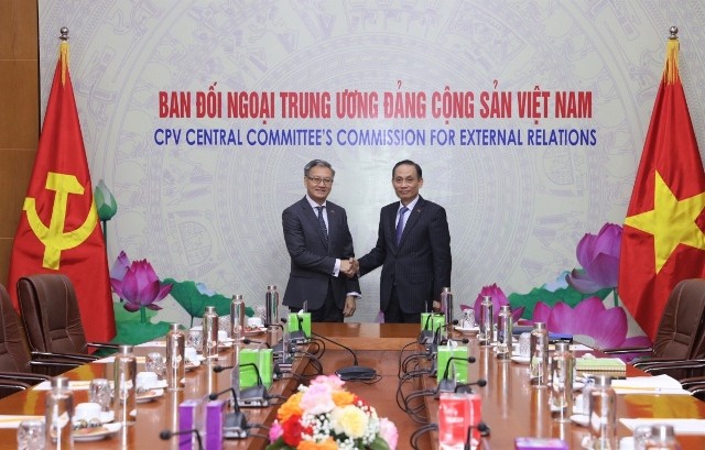 Hội đàm giữa Ban Đối ngoại Trung ương Đảng CSVN và Ban Đối ngoại Đảng NDCM Lào - ảnh 1
