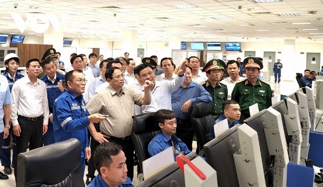 Thủ tướng Phạm Minh Chính kiểm tra tình hình thực hiện một số dự án trọng điểm Khu kinh tế Nghi Sơn, Thanh Hóa - ảnh 1