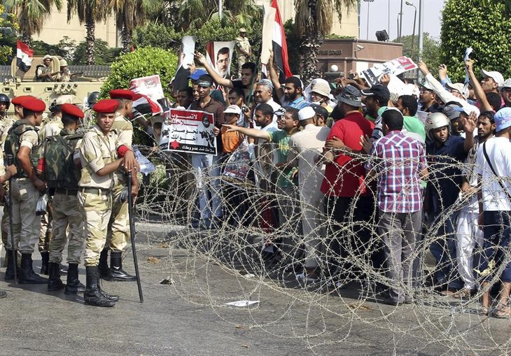 Detractores y seguidores de Mursi calientan ambiente en Egipto - ảnh 2