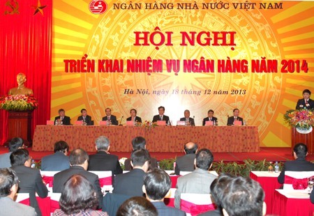 Primer ministro vietnamita orienta tareas clave de la banca en 2014 - ảnh 1