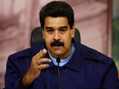 Gobierno venezolano y la oposición negocian fin de crisis política - ảnh 1
