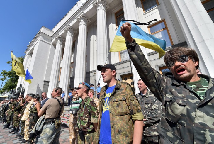 Rusia, Francia y Alemania buscan salida para la crisis en Ucrania - ảnh 1