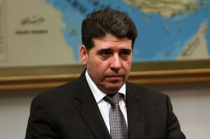 Designado de nuevo Wael Al Halaqi como primer ministro de Siria  - ảnh 1
