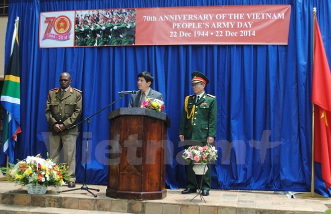 Conmemoran en Singapur y Suráfrica aniversario del Ejército Popular de Vietnam  - ảnh 1