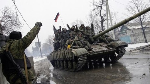 Acuerdan retiro de armas pesadas las partes del conflicto en Ucrania - ảnh 1