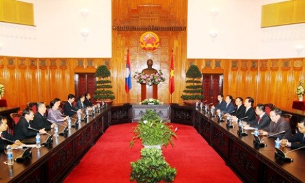 Líderes vietnamitas reciben delegaciones de Laos e India al margen de IPU 132 - ảnh 1