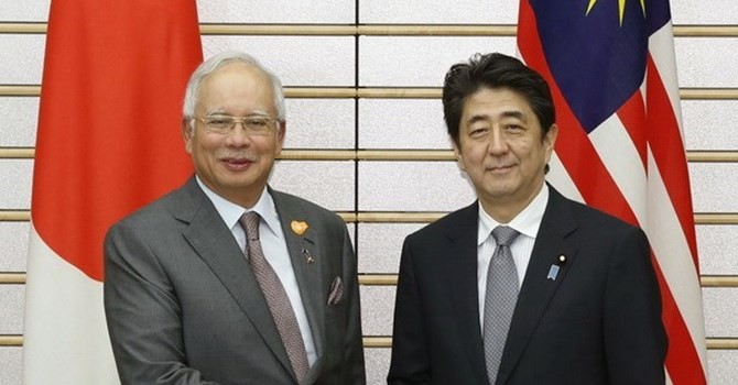Malasia y Japón elevan relaciones bilaterales a nivel de asociados estratégicos - ảnh 1