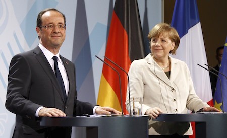 Crisis migratoria es desafío histórico para Europa, afirman líderes de Alemania y Francia  - ảnh 1