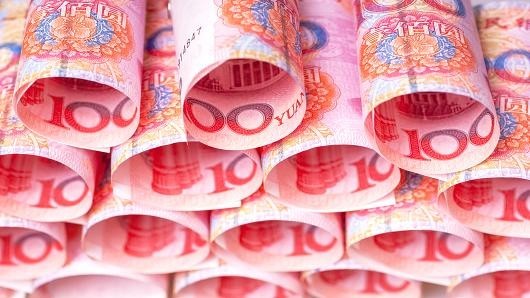 FMI aprueba inclusión del yuan chino en su cesta de monedas - ảnh 1