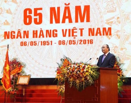 Primer ministro vietnamita honra contribuciones del Banco Estatal   - ảnh 1