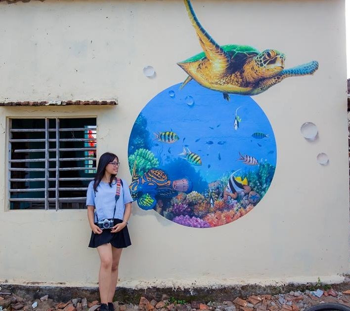 Primera aldea con pintura mural de Vietnam atrae a jóvenes - ảnh 11