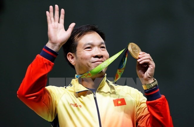 Tirador gana primera medalla dorada para Vietnam y establece nuevo récord olímpico  - ảnh 1