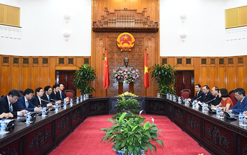 Primer ministro de Vietnam recibe a dirigentes de seguridad de China e Indonesia - ảnh 1