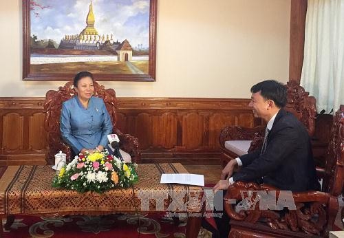 Visita del máximo líder partidista de Vietnam a Laos fomentará lazos bilaterales  - ảnh 1