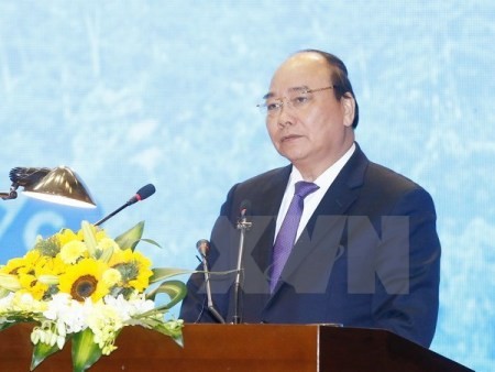 Premier de Vietnam preside reunión ordinaria mensual del gobierno  - ảnh 1