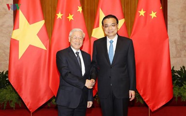 Líder partidista de Vietnam y primer ministro chino coinciden en ámbitos de colaboración - ảnh 1