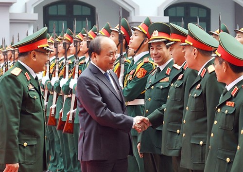 Primer ministro de Vietnam visita servicio secreto militar - ảnh 1