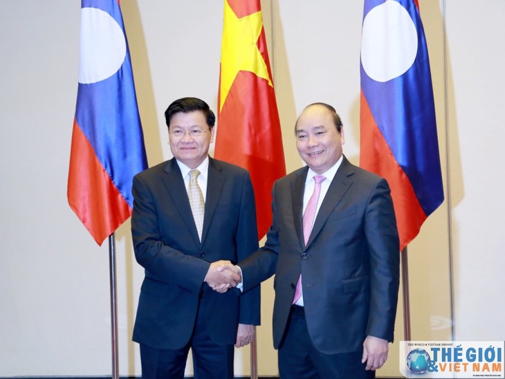 Vietnam-Laos determinados a elevar el grado de relaciones bilaterales  - ảnh 1