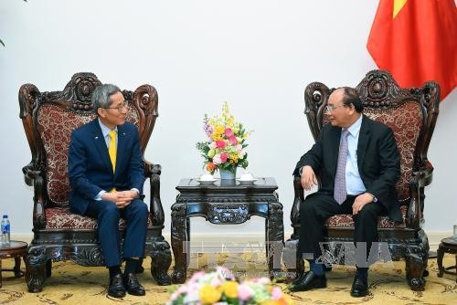 Primer ministro vietnamita recibe al presidente de corporación financiera surcoreana - ảnh 1