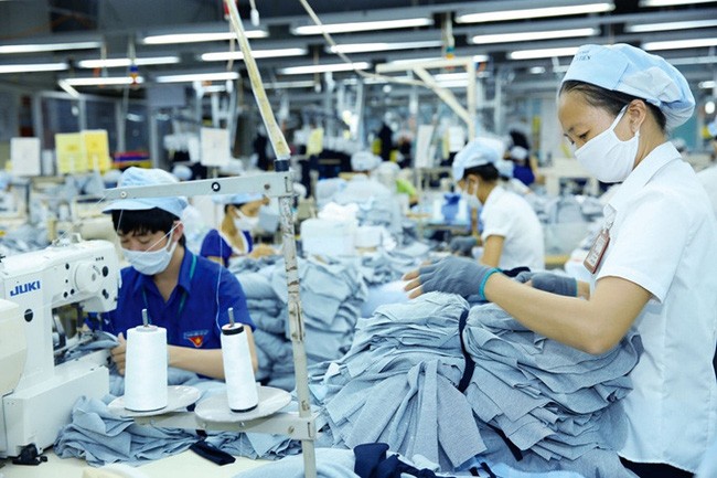 Standard Chartered reduce el pronóstico del crecimiento de Vietnam a 6,5% en 2021 - ảnh 1