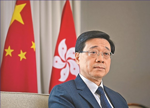 Hong Kong: John Lee, ancien chef de la sécurité pro-chinois déclare sa candidature à la direction de la ville - ảnh 1