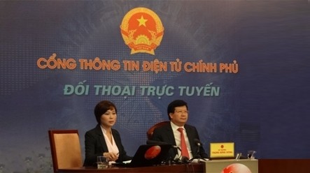 รัฐมนตรีว่าการกระทรวงการก่อสร้างเวียดนามสนทนาออนไลน์กับประชาชน - ảnh 1