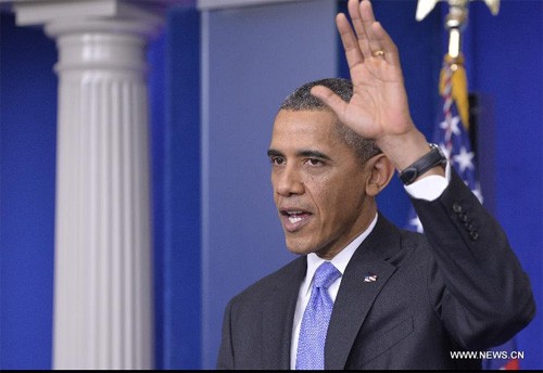 ประธานาธิบดีโอบามาแสดงความหวังว่า ประเทศสหรัฐจะมีก้าวกระโดดใหม่ในปี 2014 - ảnh 1