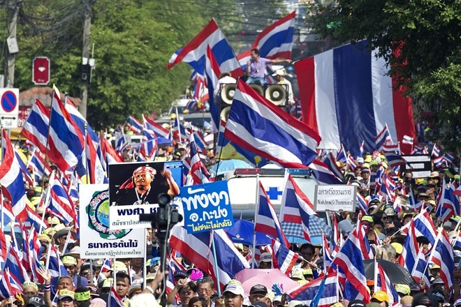 รักษาการนายกรัฐมนตรีไทยเรียกร้องให้ประชาชนออกมาใช้สิทธิ์เลือกตั้งในวันที่ 2 กุมภาพันธ์ - ảnh 1