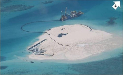สื่อฝรั่งเศสและนานาชาติลงบทความเกี่ยวกับความทะเยอทะยานของจีนในการก่อสร้างเกาะเทียมในหมู่เกาะเจื่องซา - ảnh 1