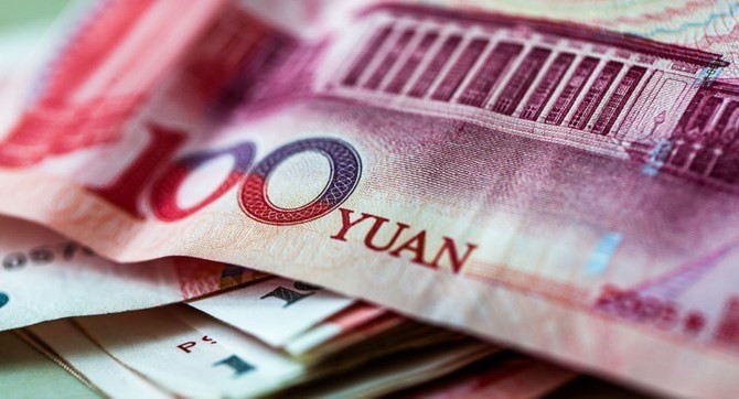 แผนการปรับลดเงินหยวนของจีน - ảnh 1