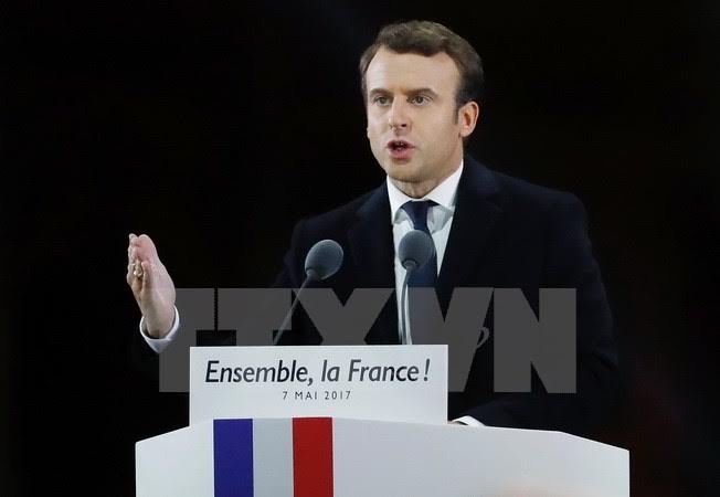 ว่าที่ประธานาธิบดีฝรั่งเศสให้คำมั่นปกป้องข้อตกลงปารีสเกี่ยวกับการเปลี่ยนแปลงของสภาพภูมิอากาศ - ảnh 1