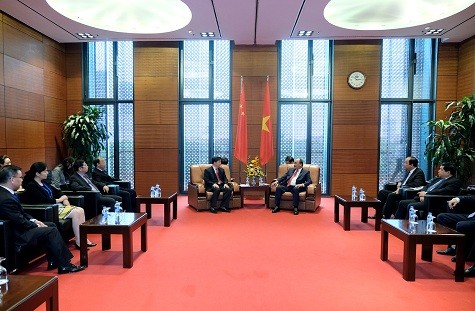 นายกรัฐมนตรีให้การต้อนรับประธานกลุ่มบริษัท Sunwah ของฮ่องกง ประเทศจีน - ảnh 3