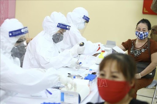 สถานการณ์การแพร่ระบาดของโรคโควิด-19 ในเวียดนามและทั่วโลกในวันที่ 24 มกราคม - ảnh 1