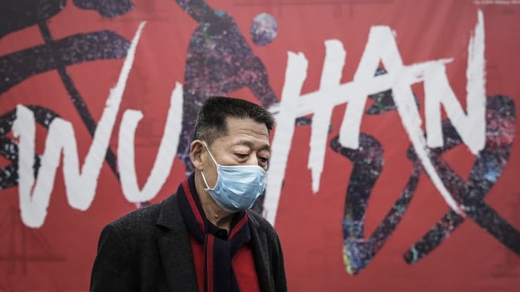 China steps up measures to fight new coronavirus - ảnh 1
