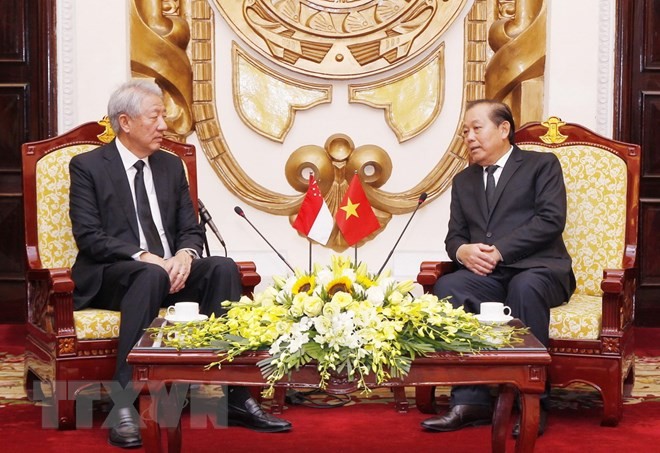  Phó Thủ tướng Thường trực Trương Hòa Bình tiếp Phó Thủ tướng Singapore  - ảnh 1