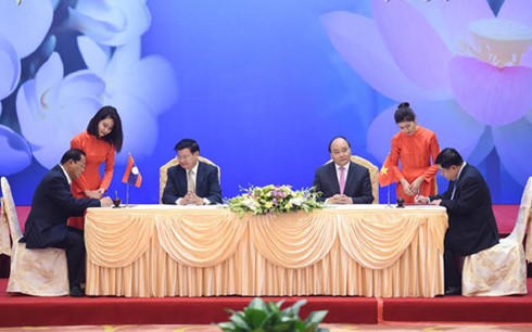 Tiếp tục cam kết triển khai hiệu quả các thỏa thuận cấp cao Việt Nam - Lào  - ảnh 1