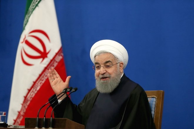 Iran's President calls for unity on revolution anniversary - ảnh 1
