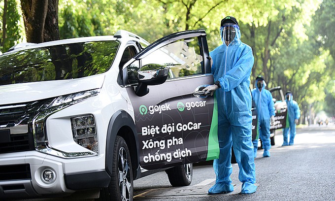 Gojek launches car service in HCMC - ảnh 1