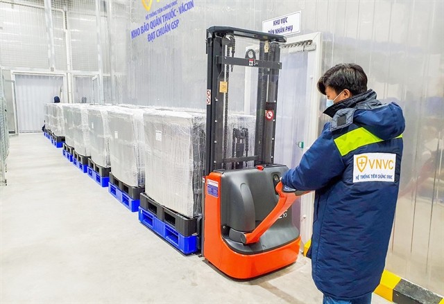 Largest batch of COVID vaccine from order with AstraZaneca arrives in Vietnam  - ảnh 1