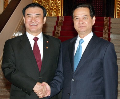 ผู้นำพรรคและรัฐเวียดนามให้การต้อนรับคณะผู้แทนระดับสูงรัฐสภาสาธารณรัฐเกาหลี - ảnh 2