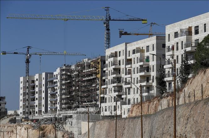 Израиль​ объявил​ о ​планах ​построить 1300 домов​ в ​своих ​поселения на​ Западном ​берегуреки Иордан - ảnh 1